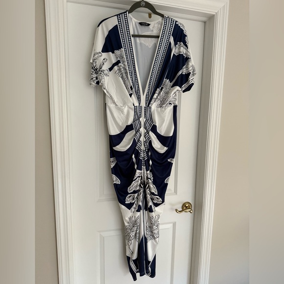Commense Dresses & Skirts - Chic Me  Navy and White Patterned Top ruched dress with deep V neck